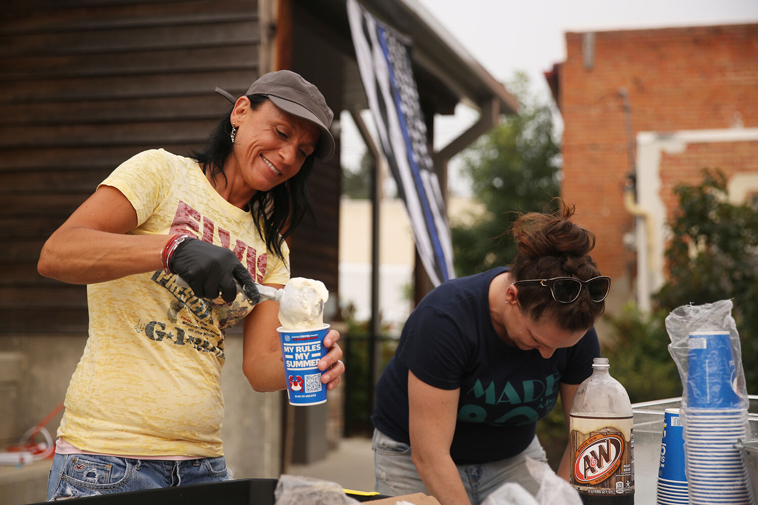 Angela Poole and Savannah French make root beer floats